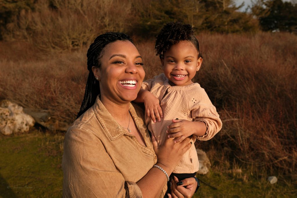 mother and toddler smiling
